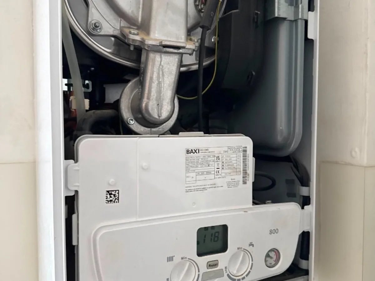 Baxi 800 combi boiler with casing removed during repair